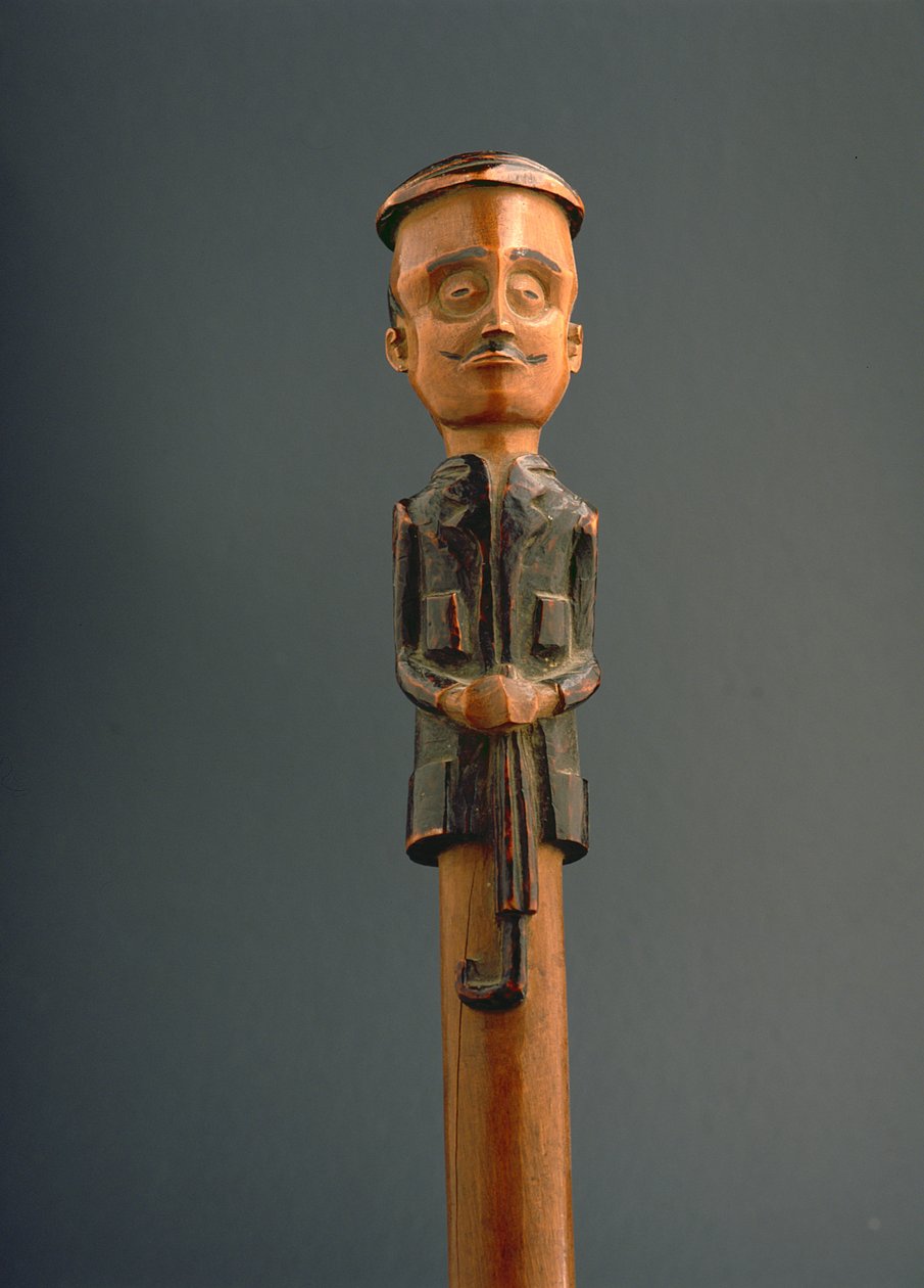 Hold deg til en figur av en europeisk mann som har på seg en caps og holder en paraply, Ovimbundu, Angola, sent på 1800-tallet (tre) av African