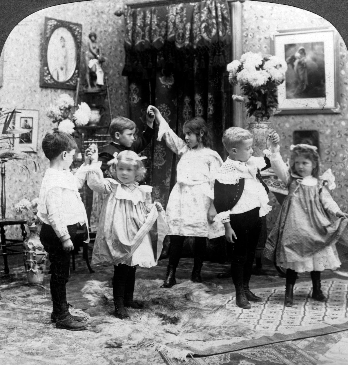Dansetimen. av American Stereoscopic Company
