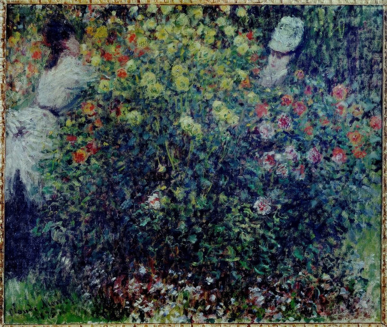 Unge jenter i en klump av dahliaer av Claude Monet