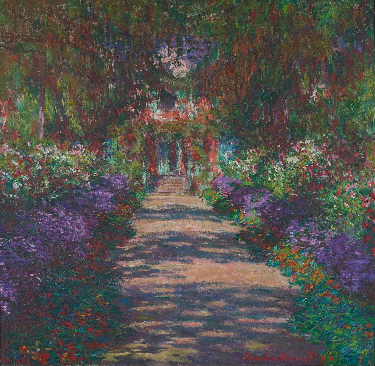 En allé i Monets hage ved Giverny av Claude Monet