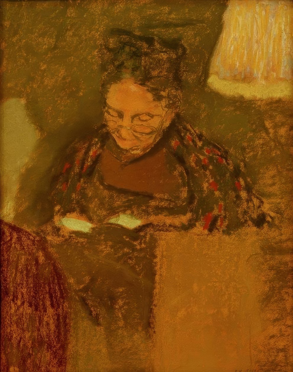 Madame Vuillard leser ved lyset fra en lampe av Edouard Vuillard