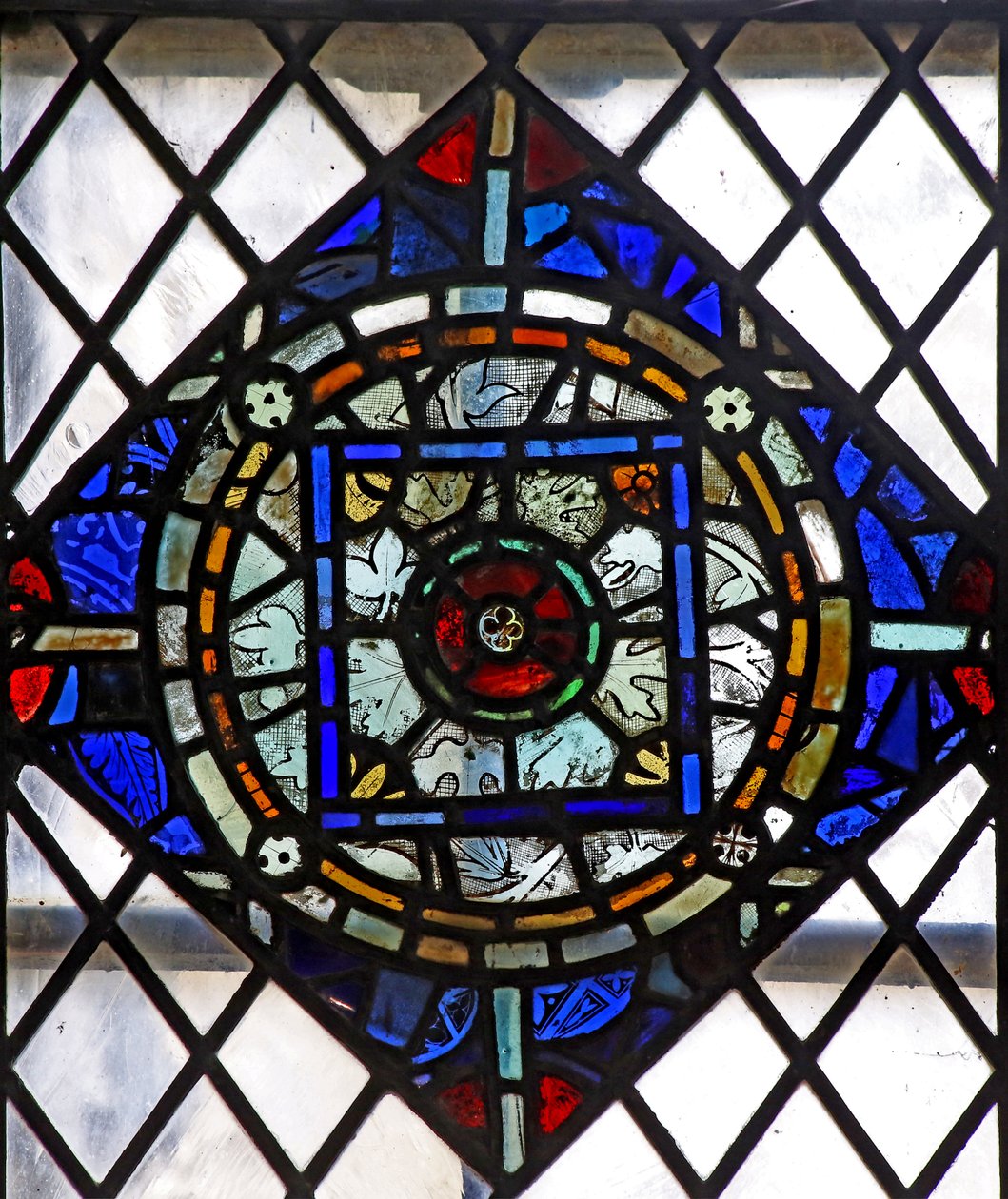 Vindu s4 som viser et tilbakestilt geometrisk panel av English School