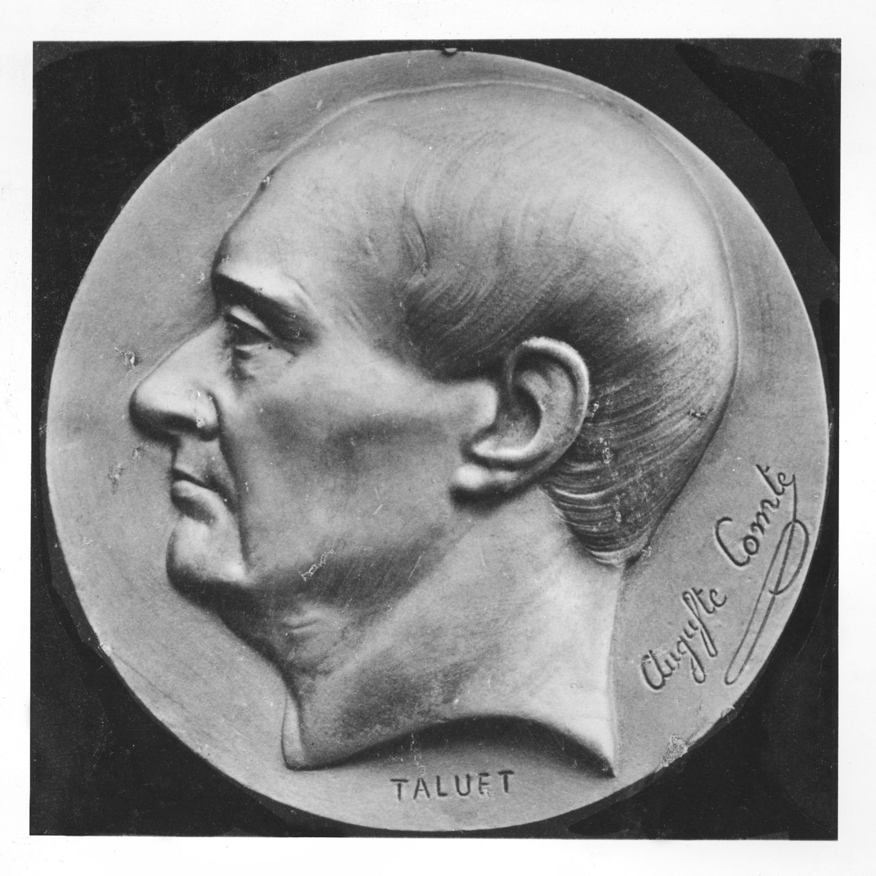 Medaljong av Auguste Comte (marmor) av Ferdinand Taluet