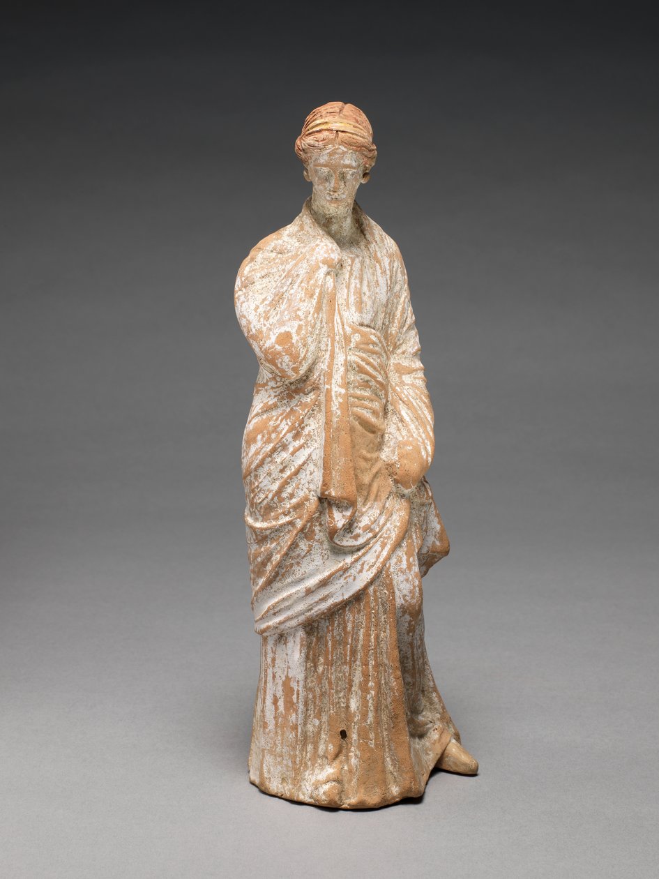 Statuett av en kvinnelig figur (leire) (for bakside se 427629) av Greek