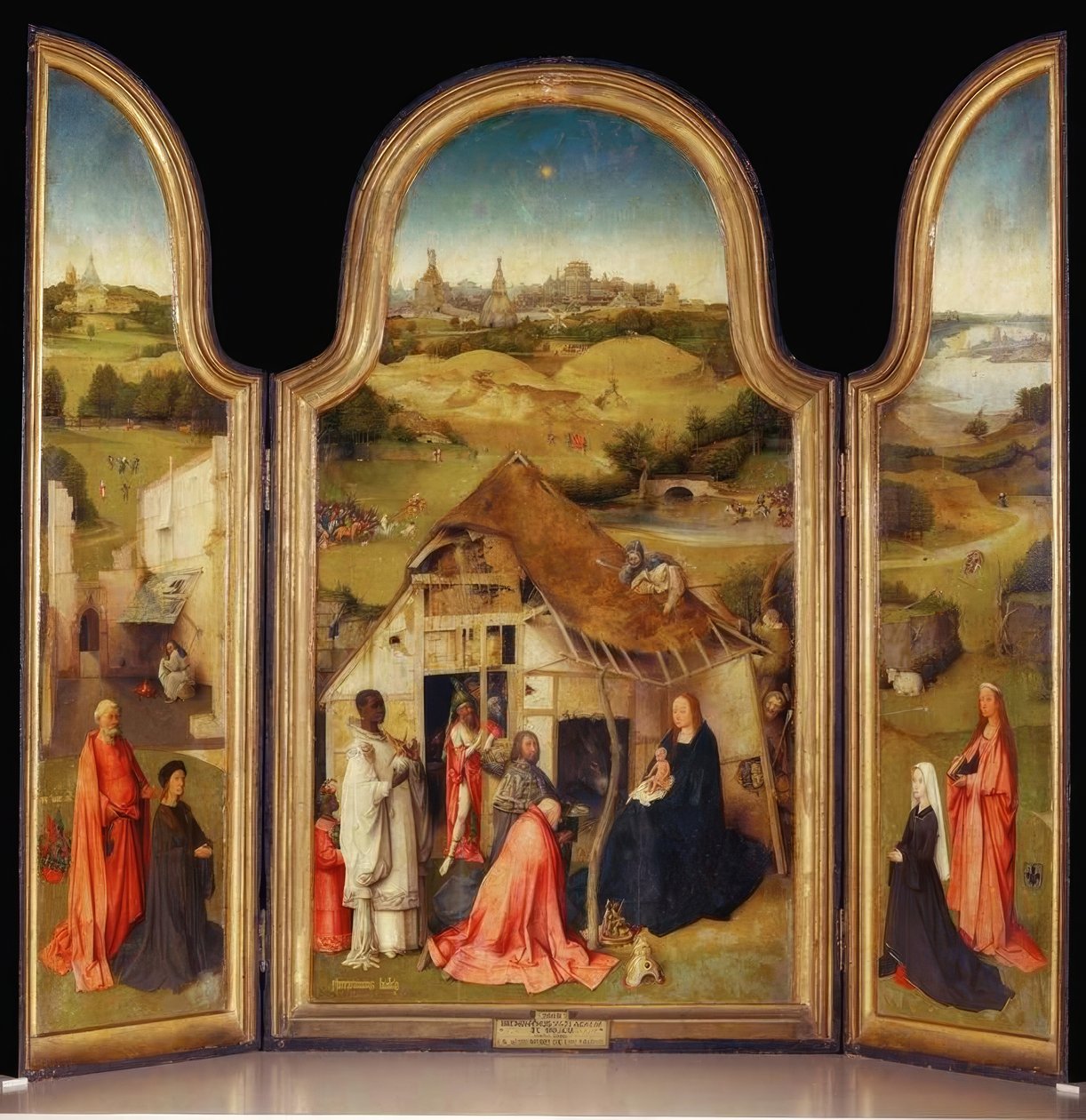 Tilbedelse av magiene av Hieronymus Bosch