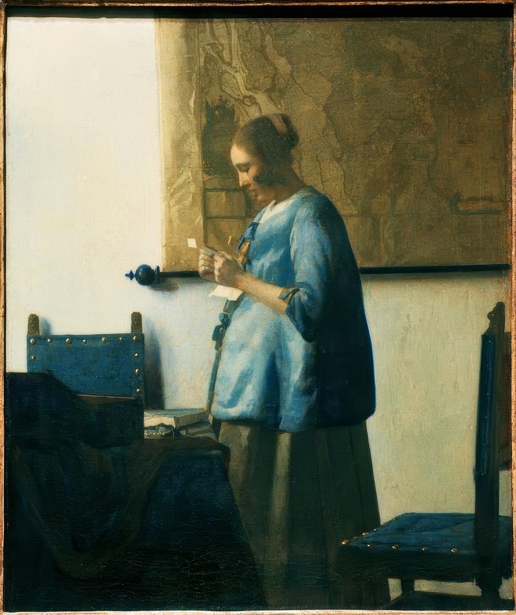 Bokstavleser i blått av Jan Vermeer van Delft