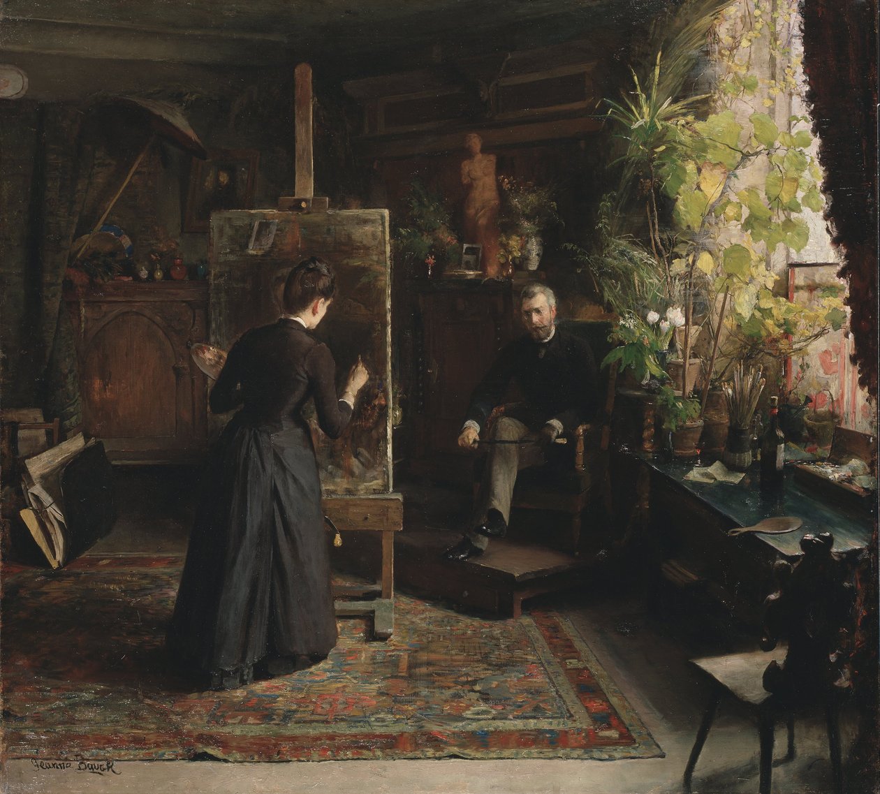 Den danske kunstneren Bertha Wegmann som maler et portrett av Jeanna Bauck