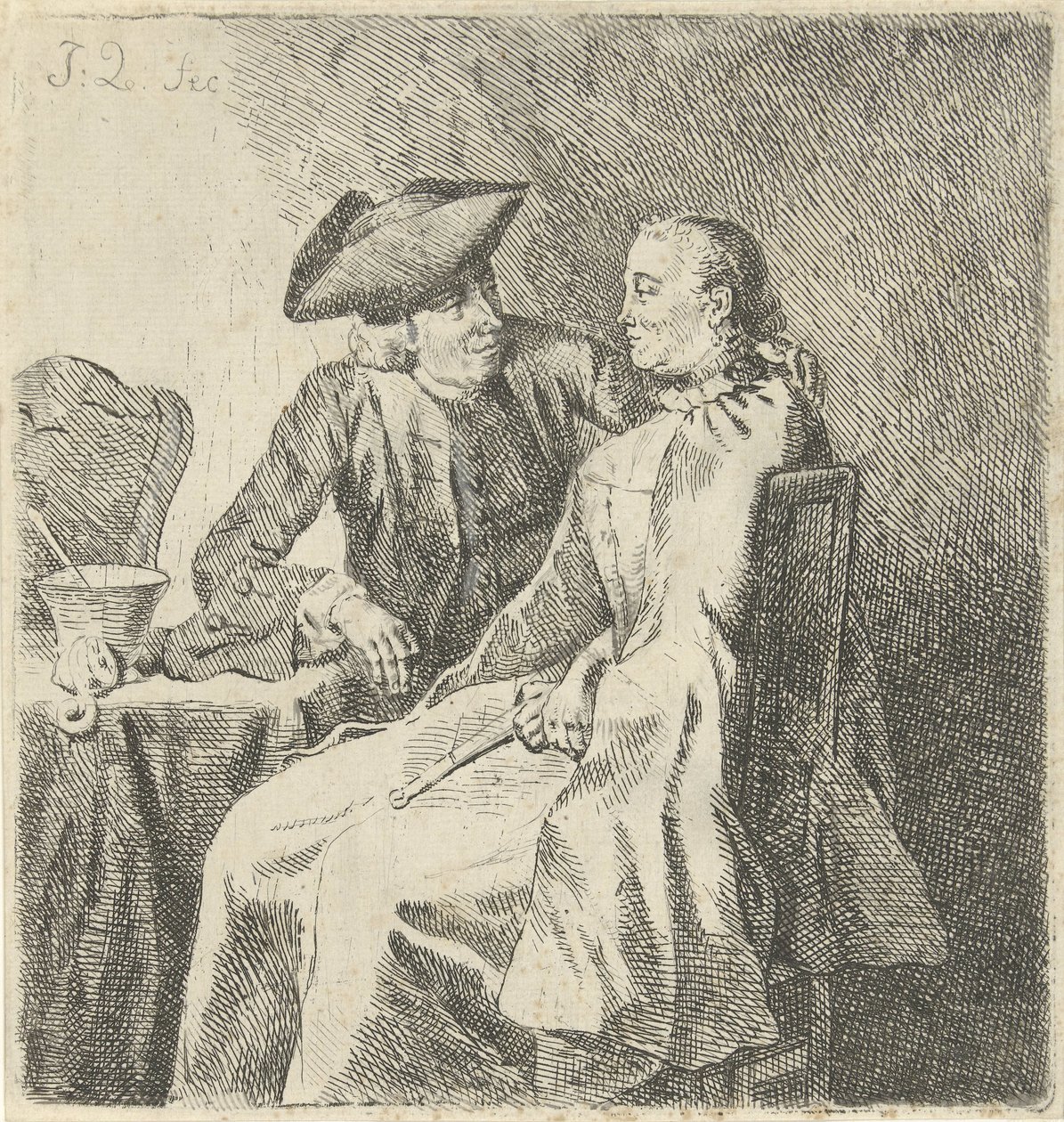 Mann og kvinne ved et bord av Julius Henricus Quinkhard