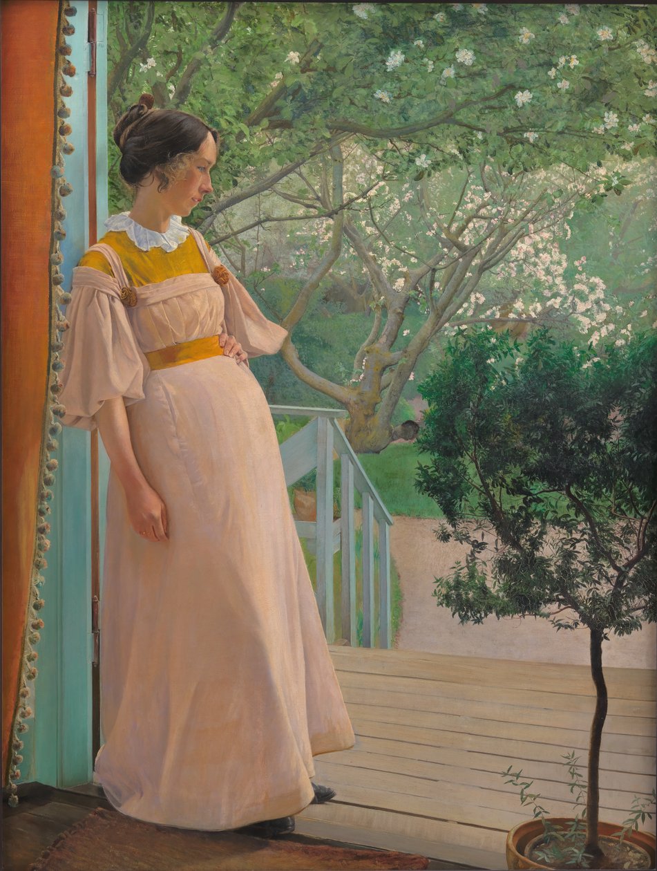 Ved de franske vinduene. Kunstnerens kone av Laurits Andersen Ring