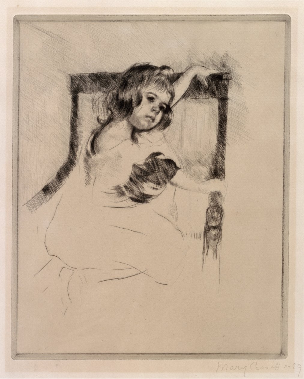 Knel i lenestol av Mary Cassatt