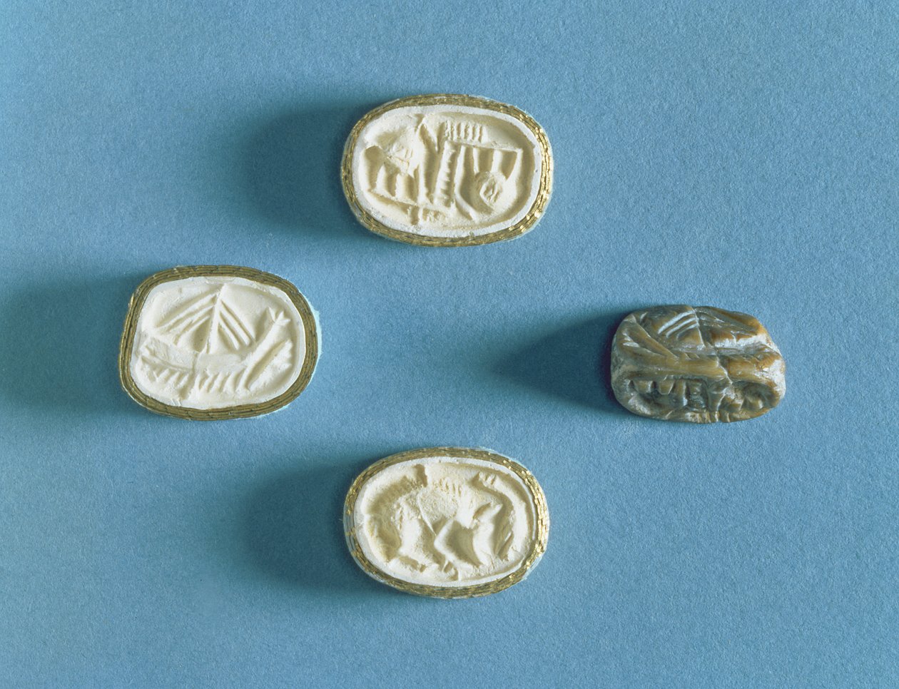 Segl med tre avtrykk fra Knossos, tidlig minoisk (steatitt) av Minoan
