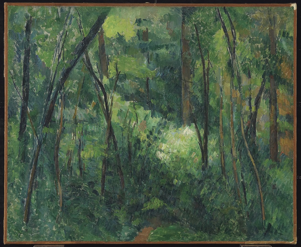Interiør i en skog, ca. 1885 av Paul Cézanne