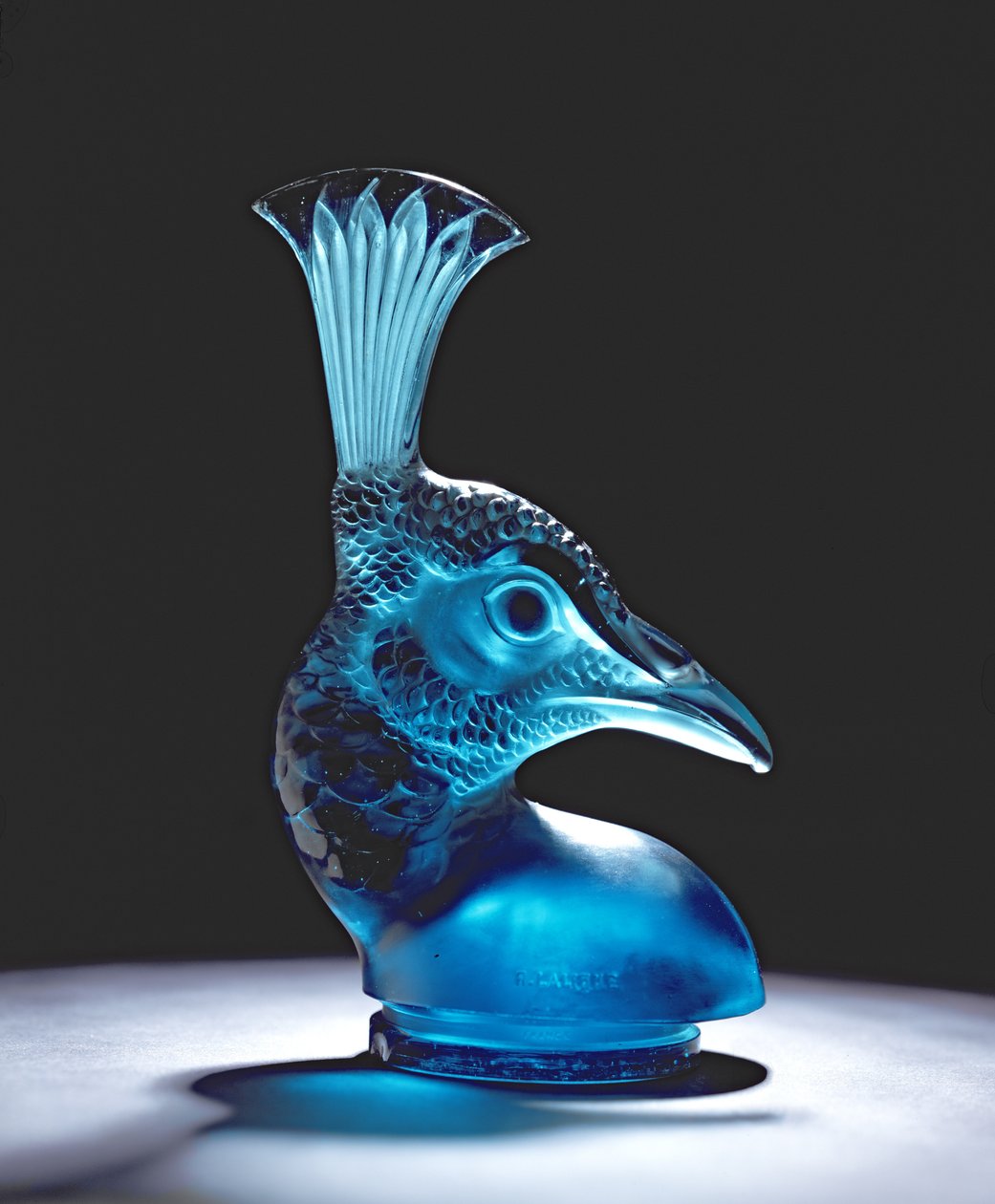 Påfuglhodet turkis stopper (glass) av Rene Jules Lalique