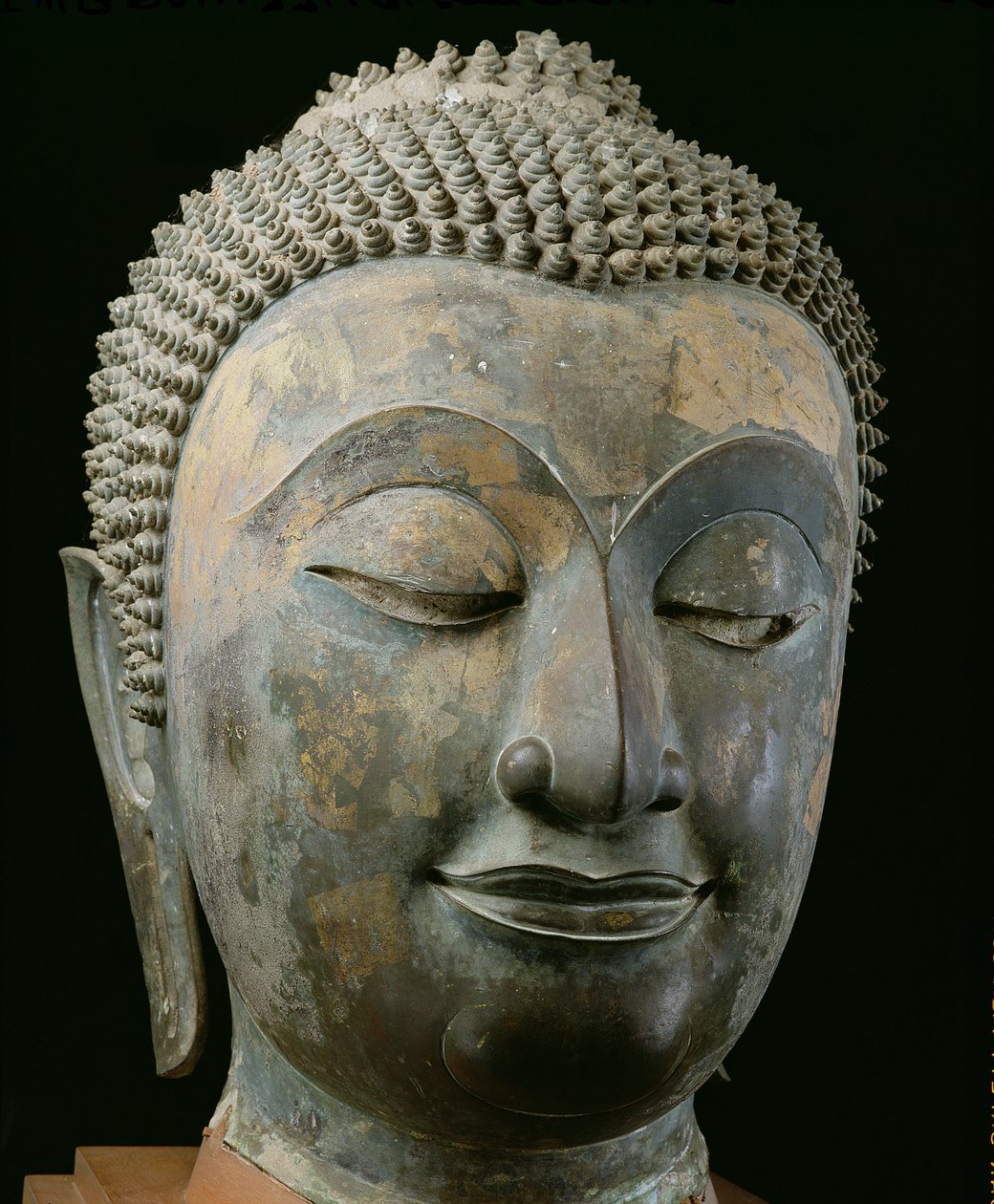 Hodet til en gigantisk Buddha (bronse) av Thai