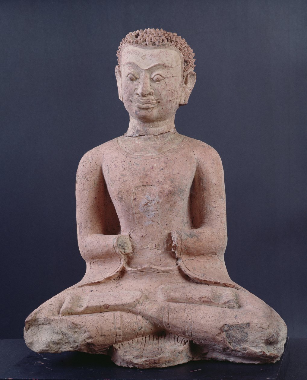Disippel i tilbedelse (terrakotta) av Thai School