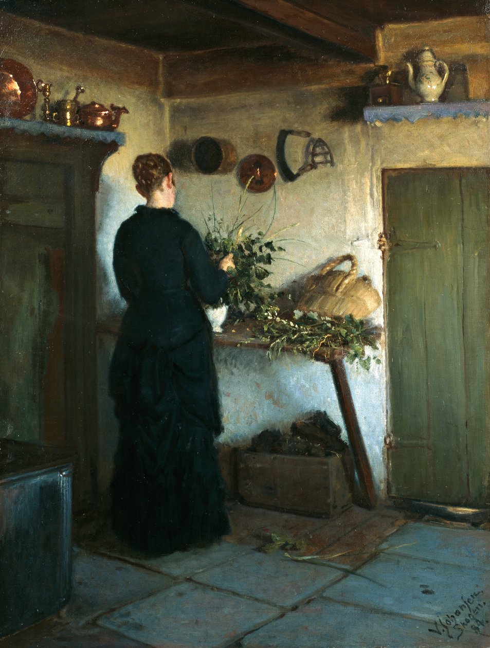 Kunstnerens kone arrangerer blomster av Viggo Johansen