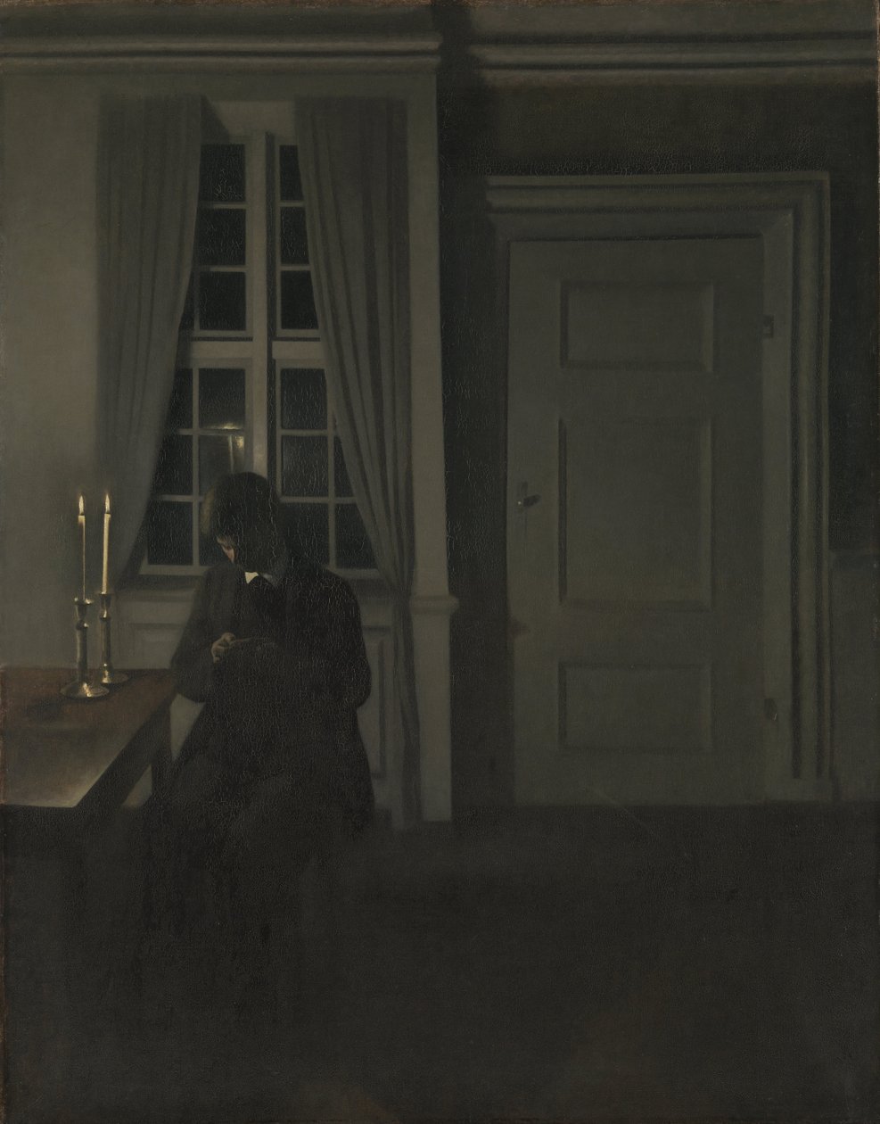Myntsamleren av Vilhelm Hammershøi