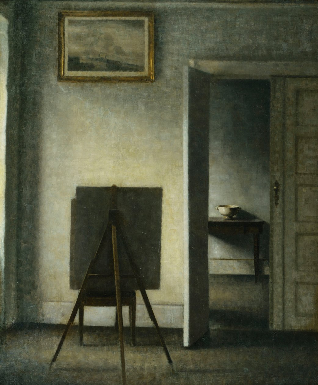 Et interiør med kunstnerens staffeli, av Vilhelm Hammershoi