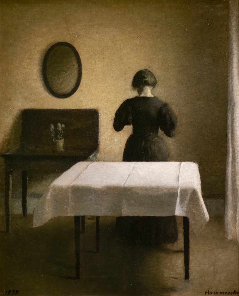 Interiør med en rygg kvinne av Vilhelm Hammershoi