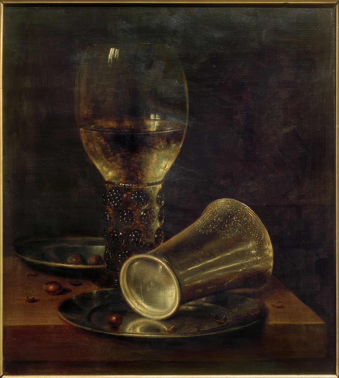 Stilleben med veltet drikkebeger av Willem Claesz. Heda