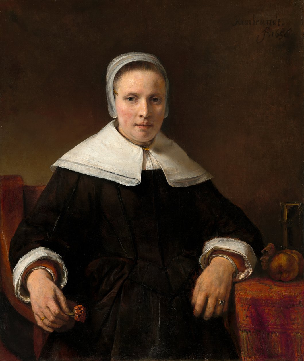 En kvinne som holder en rosa av Workshop of Rembrandt