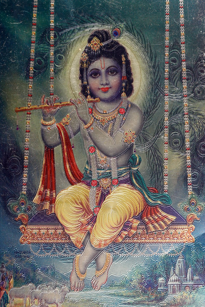 Lord Krishna med fløyte. hinduistisk gud. av . .