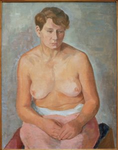 Sitter naken kvinne