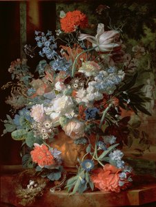 Bukett med blomster i et landskap
