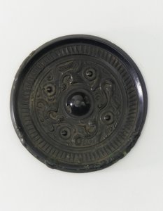 Fragment av en statuett