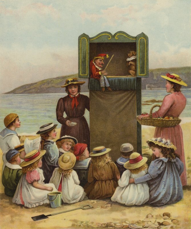 Barn ser på et Punch and Judy-show på stranden av English School