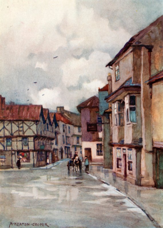 Axbridge (farge litho) av Alfred Heaton Cooper