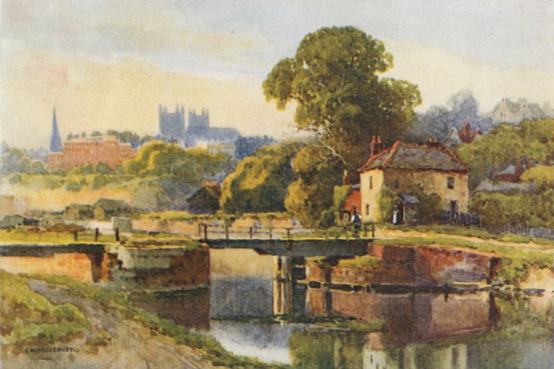 Exeter fra kanalen (farge litho) av Ernest William Haslehust