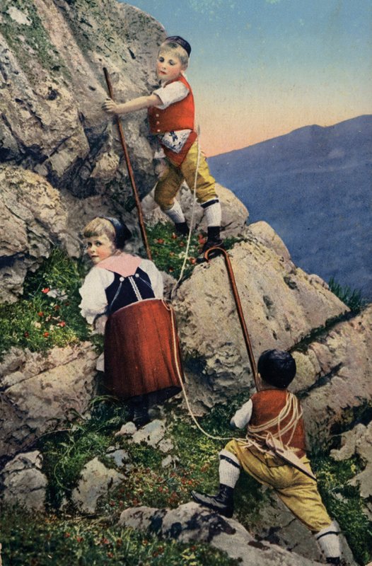 Barn som klatrer i Alpene (bilde) av European Photographer