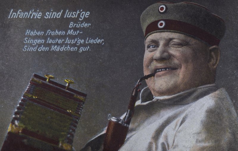 Tysk soldat røyker pipen (farget bilde) av Photographer German